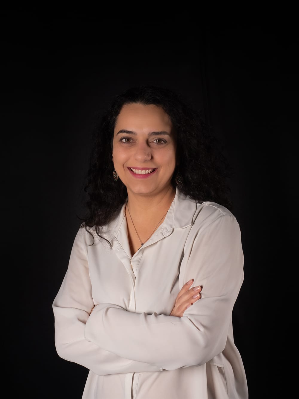 Eva, equipo de atención al paciente Retrato corporativo de Eva, profesional de atención al paciente en García Rielo